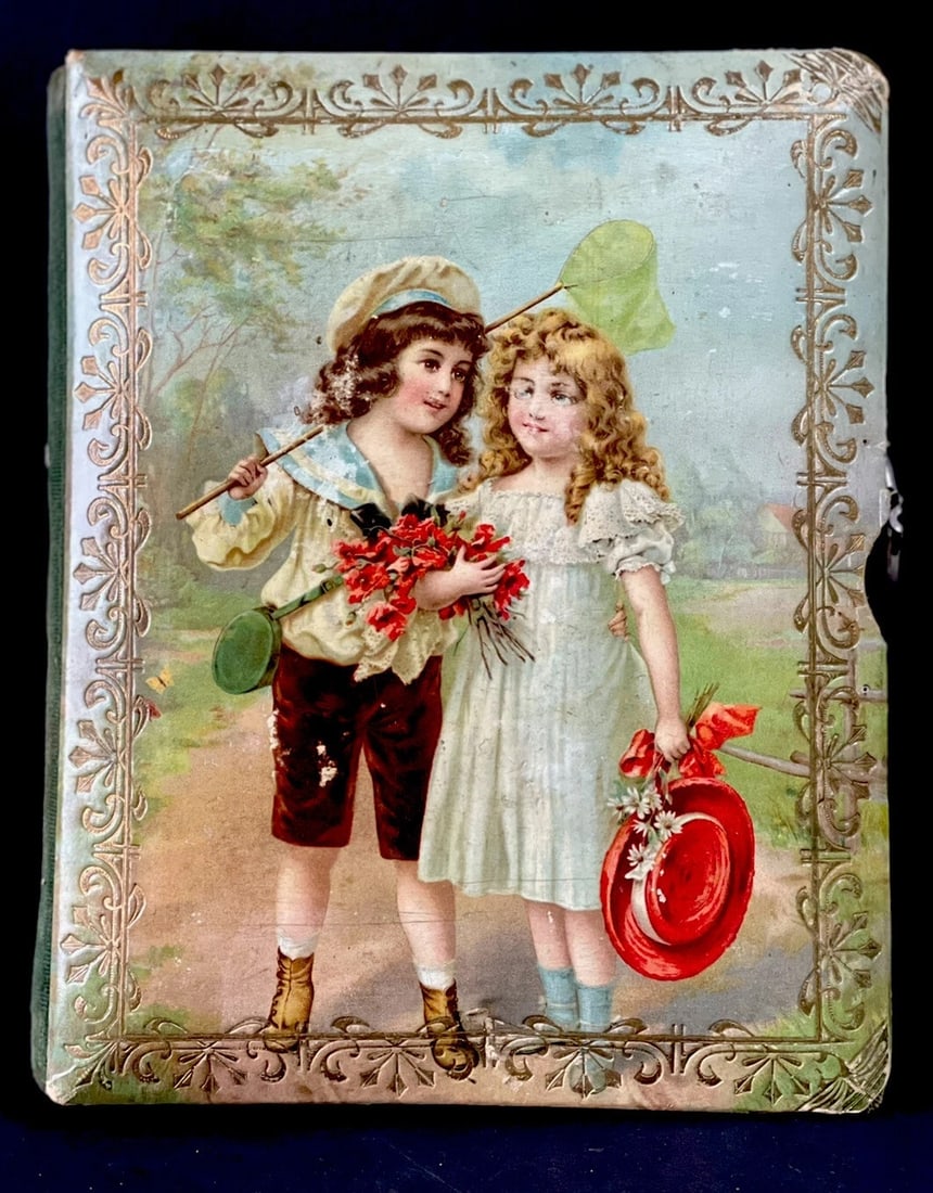Antique Swiss (?) Celluloid Photo Album with Antique Photos: Antique celluloid photo album with antique photos.This item has a celluloid cover with beautiful victorian style picture of boy and girl.Album with some antique photos ( album is not completely full b