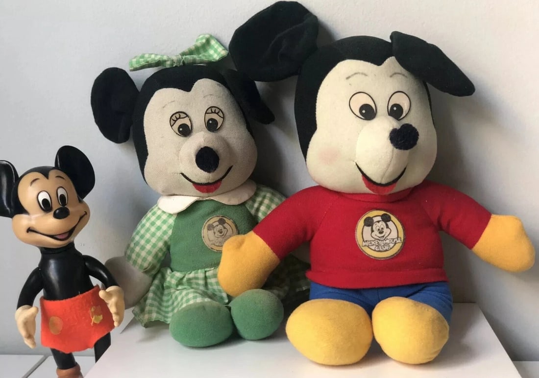 Lot Of 2 Vintage 1970's Disney Mickey Mouse Plush Toys & Vinyl Squeaky Mickey: Lot Of 3 Vintage 1970's Mickey Mouse Toys :2 plush toys - Mickey and Minnie Mouse. Mickey is about 13" tall. His nose needs to be reattached. Some stains; needs cleaning. Minnie is about 12" tall. Nee