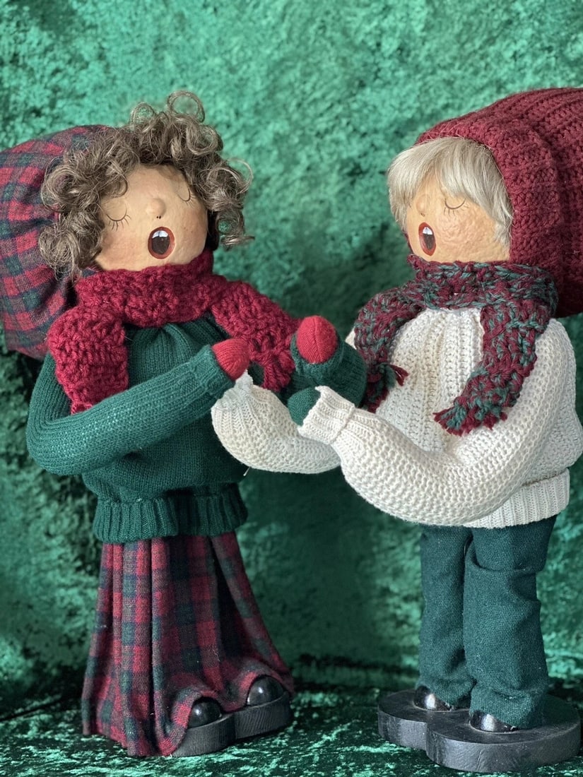 Lot Of 2 Large 16" Handcrafted Christmas Carolers Papier Mache (?) & Wood Dolls: Lot of 2 whimsical Christmas carolers dolls!!Each doll is approximately 16" tall with the stand and 15" without it.Each doll is handcrafted ; one of the dolls has a sticker with the name of the compan