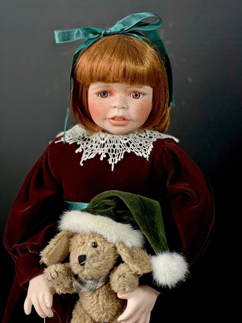 Kaye Wiggs Porcelain 22" Doll "Lana": Beautiful doll by Kaye Wiggs, Australian doll artist.Her name is Lana and she is s limited edition of 2500 dolls. Lana is about 22" tall. She has porcelain swivel head and torso, partial arms and legs