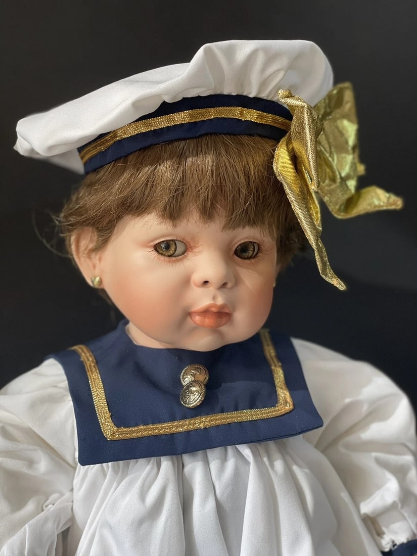 MIB Collectible 25" Doll "Jolie" by Fayzah Spanos LE 2000: Beautiful doll Jolie by Fayzah Spanos!Comes with her original box, tag, certificate and accessories.She is a limited edition of 2000 dolls.This doll is approximately 25" tall.Porcelain head and partia