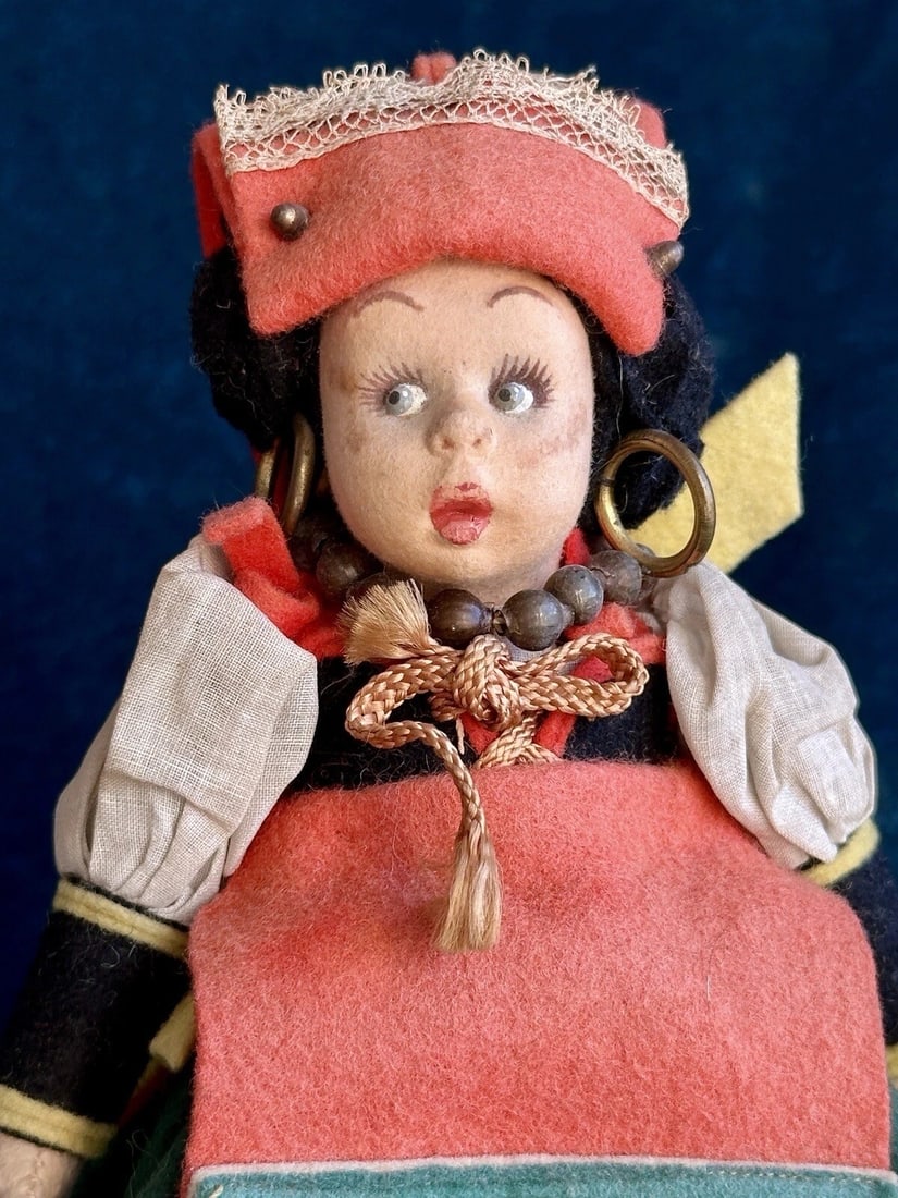 Vintage Italian Mascotte Miniature 8" Lenci Felt/Cloth Hanging Doll: Adorable little doll. She is all original. She is missing her tag, there are just threads left from the tags. The doll shoes some signs of wear that can be seen on the photos. They include stains and