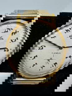Vintage Saron Hebrew Dial Watch – 17 Jewel Manual Wind - (023 white): A rare vintage wristwatch by Saron, featuring Hebrew letters in place of traditional hour numerals. The watch face reads “17 Jewels&rdquo; and has a sub-second dial at the 6 o'clock position. Gold-t