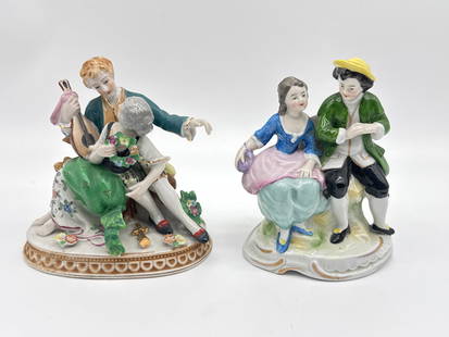 Pair of Vintage German Porcelain Courting Couple Figurines – Hand-Painted (089 white): This charming pair of vintage porcelain figurines captures the elegance and flirtation of 18th-century courtship. Each piece depicts a finely dressed couple in mid-scene—one couple with a lute in ha