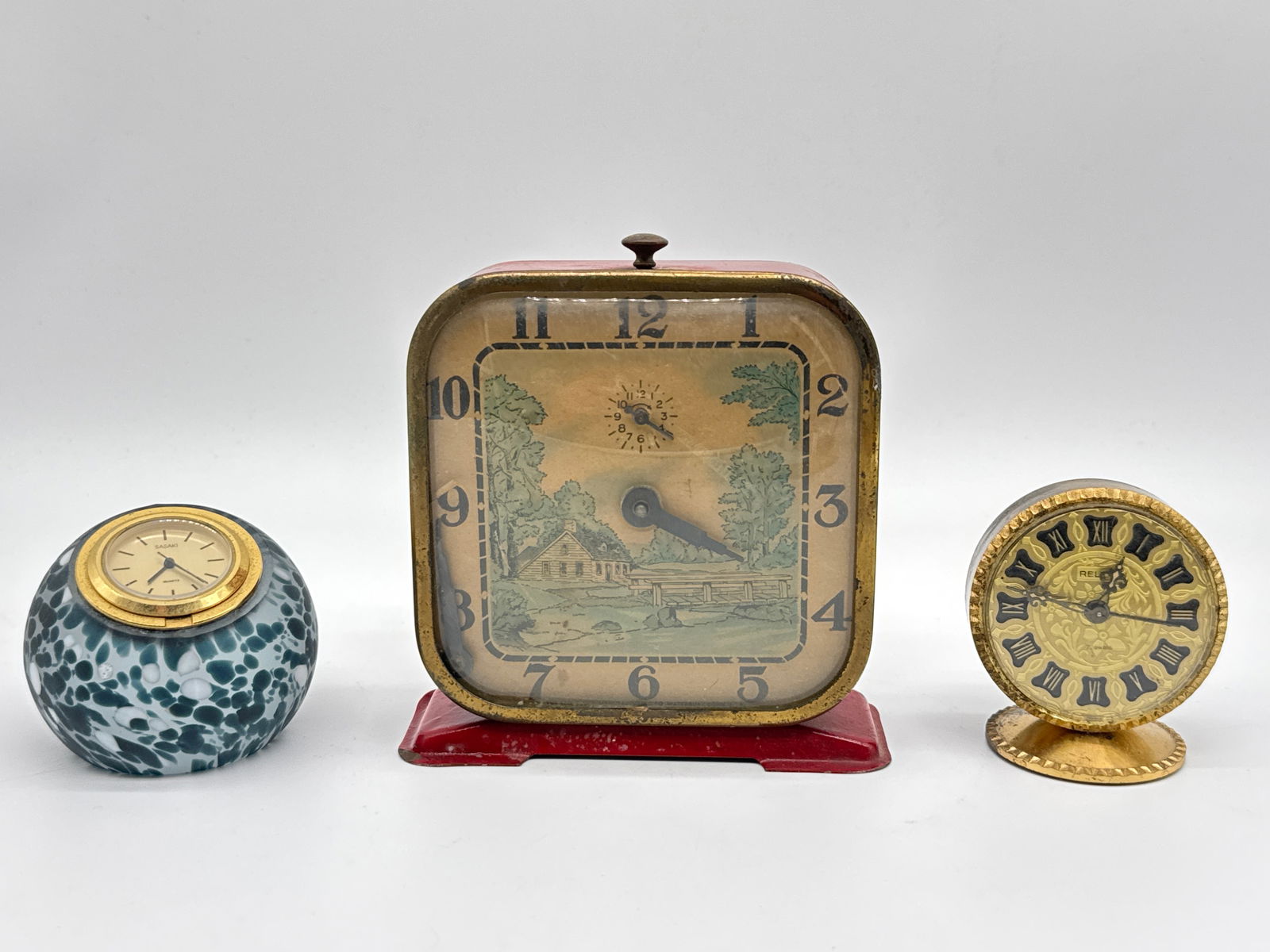 Vintage Clock Trio – Asaki Crystal Paperweight, Litho Tin Cabin Scene, and Miniature (1 of 10)