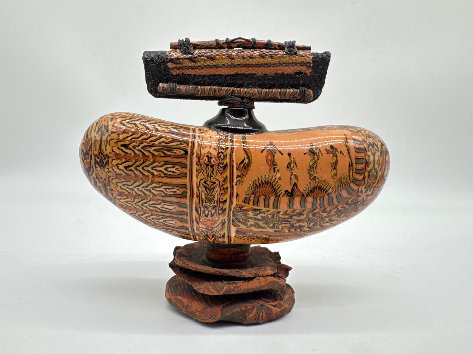 Claire Roger Signed Covered Gourd Flask Sculpture – Tribal-Inspired -178white: Get ready for a global journey—no passport required. This striking covered flask sculpture by Claire Roger is a tactile tapestry of texture and movement. Crafted in the form of a stylized gourd, the