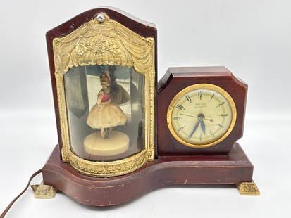 Vintage United Musical Dancing Ballerina Mantel Clock (024orange): This enchanting vintage United mantel clock features a spinning ballerina, a glowing lighted base, and a built-in music box—bringing charm and movement to any tabletop or mantle. Housed in a glass d