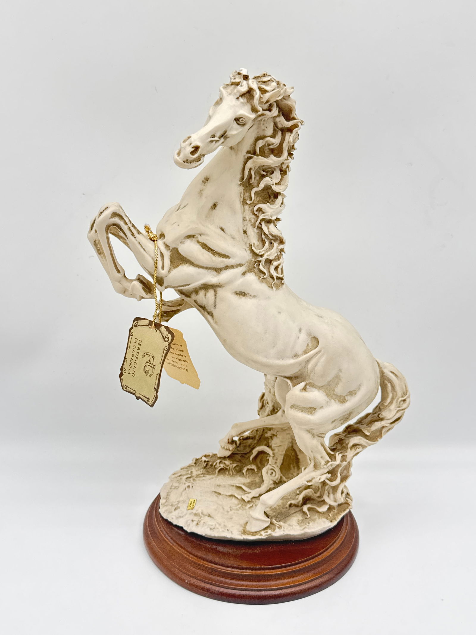 Vintage Capodimonte Italian Porcelain Bisque Figurine – Napoleon on Horseback with tag (037: A striking and finely detailed Capodimonte porcelain bisque figurine, depicting Napoleon Bonaparte on horseback, in classic heroic pose. Crafted in Italy in the traditional Capodimonte style, this pie