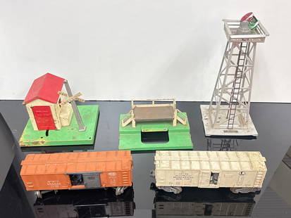 Vintage Lionel Accessory & Train Car Collection (038 orange): Step back into the golden age of American model railroading with this charming mixed lot of Lionel postwar O-gauge accessories and rolling stock, built with the craftsmanship and whimsy that defined a