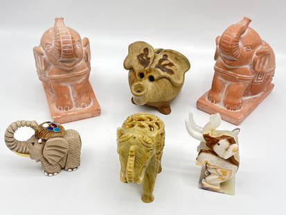Elephant Figurines – Carved, Terracotta, Inlaid, and Decorative–Varied Materials & Eras(050: This unique 7-piece elephant figurine lot brings together different styles, cultures, and materials, making it a delightful find for collectors or lovers of pachyderm-themed decor. The group includes: