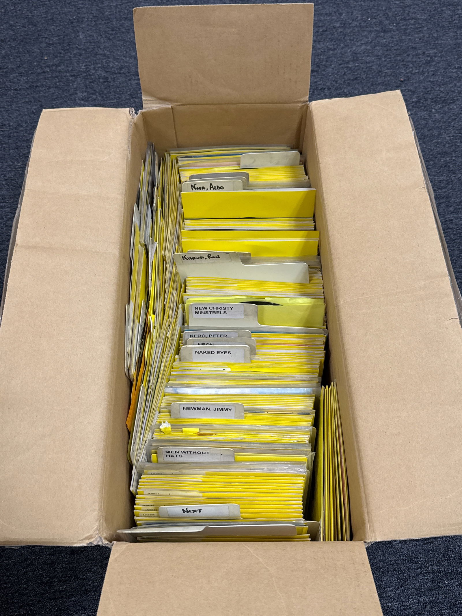 Large Box Lot of 45 RPM Records  - 065 orange (1 of 8)