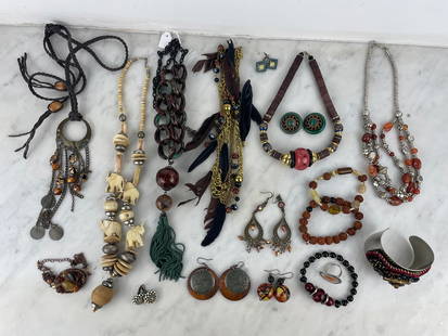 Ethnic-inspired costume jewelry set - Necklaces, bracelets, earrings, and rings. A selection of: Ethnic-inspired costume jewelry set - Necklaces, bracelets, earrings, and rings. A selection of jewelry combining natural and decorative materials: wood, metal, beads, feathers, glass, and textiles. I