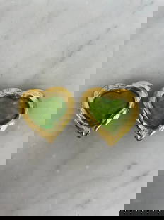 LOOLA Paris - Pair of heart clips, circa 2000 Fancy metal clips forming stylized hearts, filled with: LOOLA Paris - Pair of heart clips, circa 2000 Fancy metal clips forming stylized hearts, filled with translucent green resin. Signature "LOOLA Paris" on the reverse. Pop creation typical of Parisian f