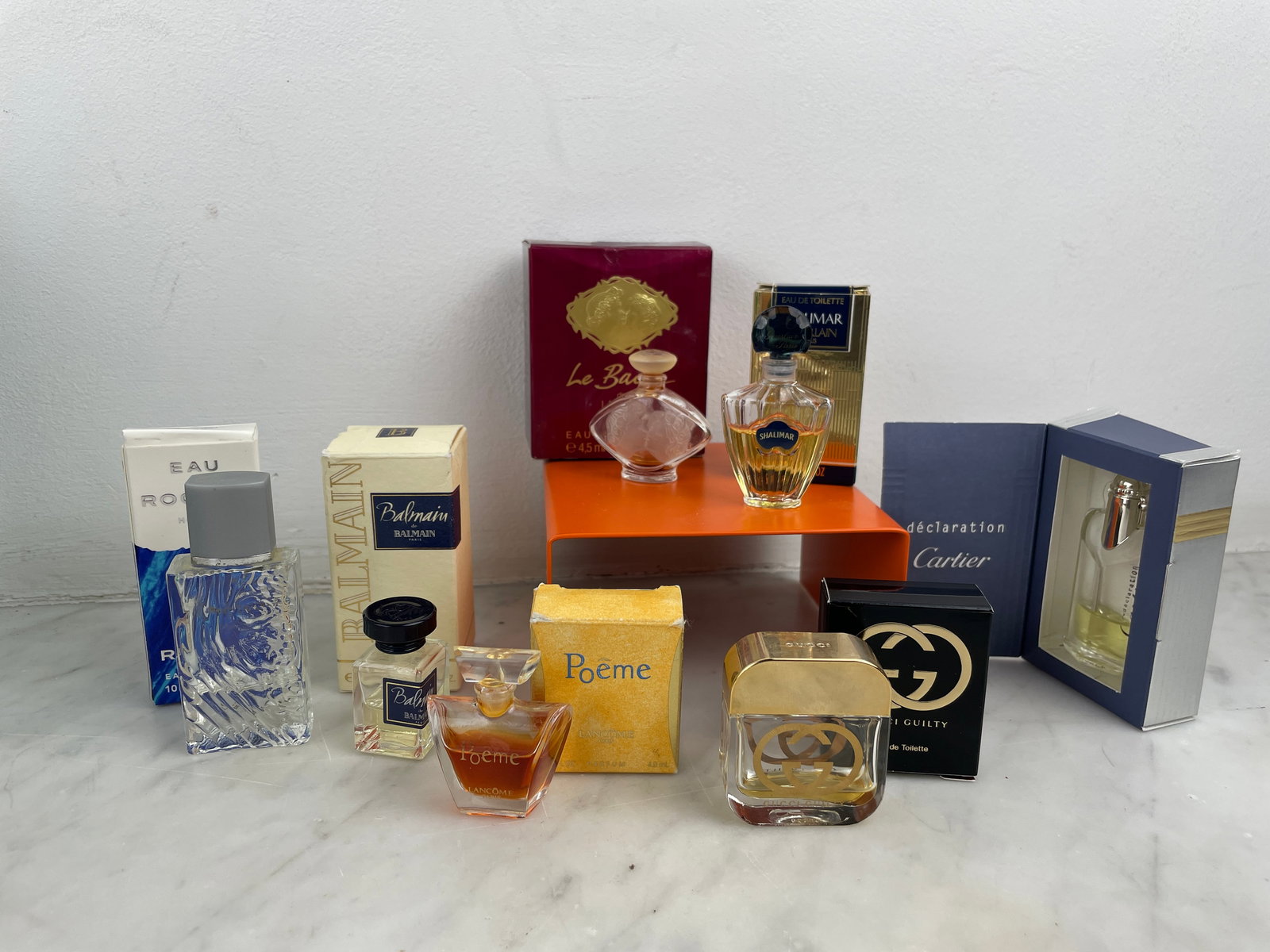 Collection of 7 miniature perfume bottles - Grands Maisons, with boxes Iconic selection including: Collection of 7 miniature perfume bottles - Grands Maisons, with boxes Iconic selection including creations by Lancome, Guerlain, Cartier, Gucci, Lalique, Rochas and Balmain. Each bottle has a distinc