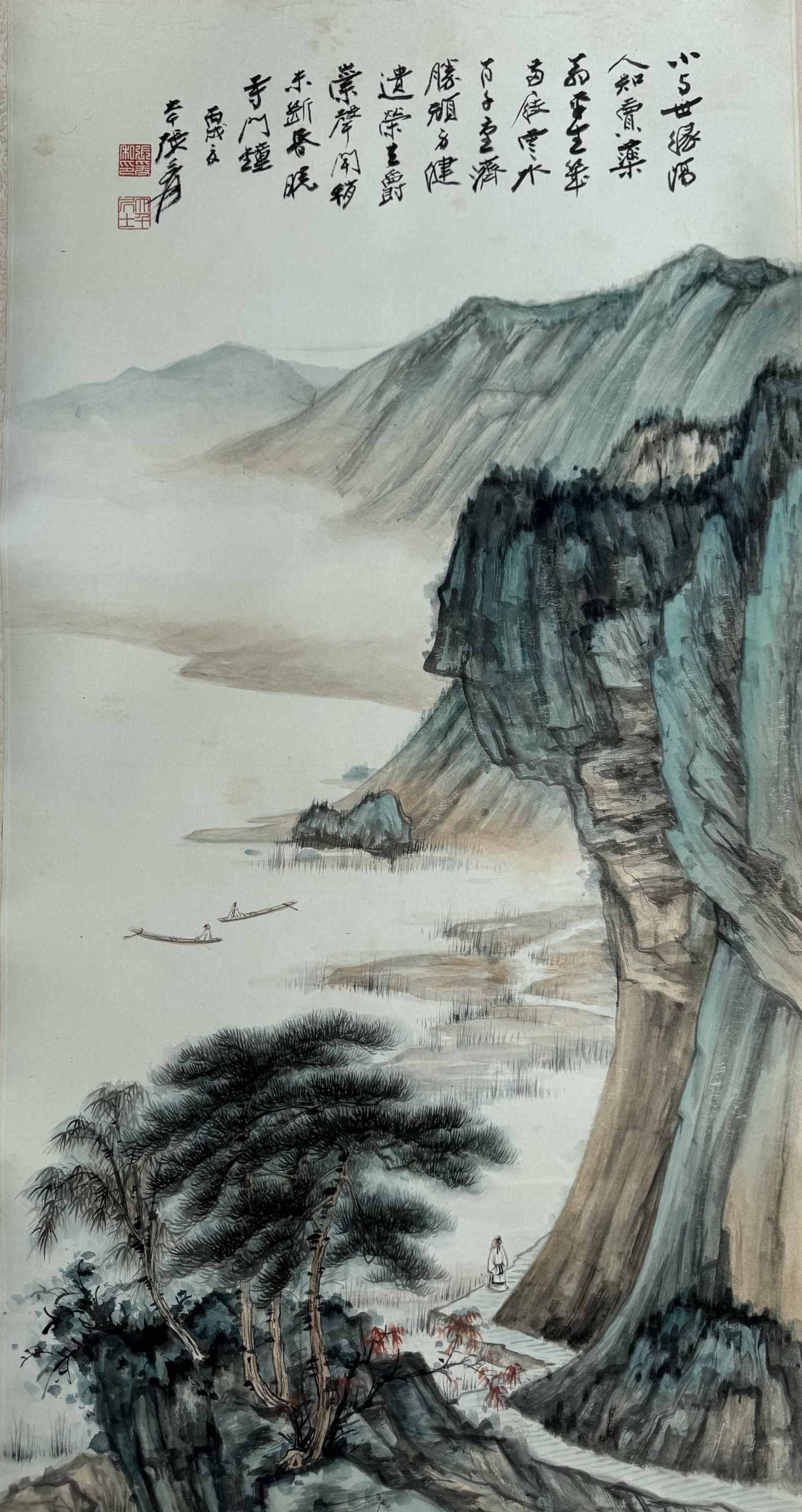 Zhang Daqian - Landscape: 45cm x 86cm. An exceptional classical-style landscape painting by Zhang Daqian. The composition features a towering cliff rendered with bold axe-cut texture strokes and refined mineral pigments,