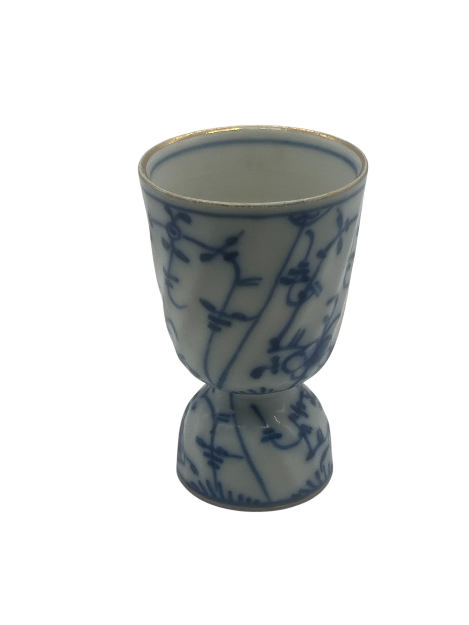 Antique Chinese Blue & White Porcelain Egg Cup, Delicate Floral Motif: This charming antique Chinese porcelain egg cup showcases the classic blue and white aesthetic, reminiscent of Qing Dynasty craftsmanship. The cup features a delicate hand-painted floral motif, with i