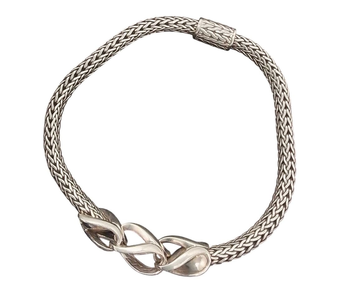 John Hardy Icon Style bracelete with 3 knots: Beautiful sterling silver bracelete from John hardy, with his unique clasp showing his mark and 925, this bracelete is a statement piece no longer offered.