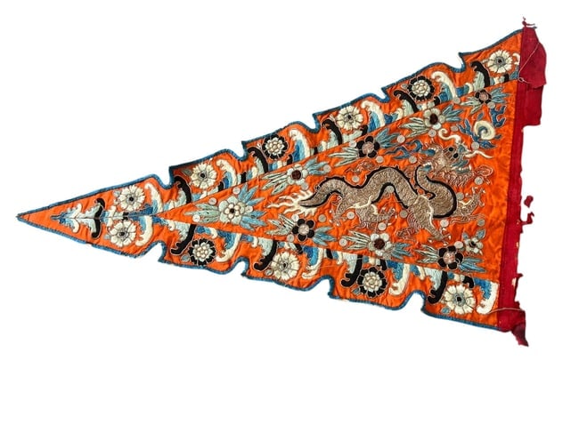 Antique Chinese Embroidered Dragon Pennant: Antique Chinese Embroidered Triangular Pennant, likely a temple or ceremonial banner, featuring a vibrant orange silk ground densely embellished with intricate gold thread depictions of dragons, flowe