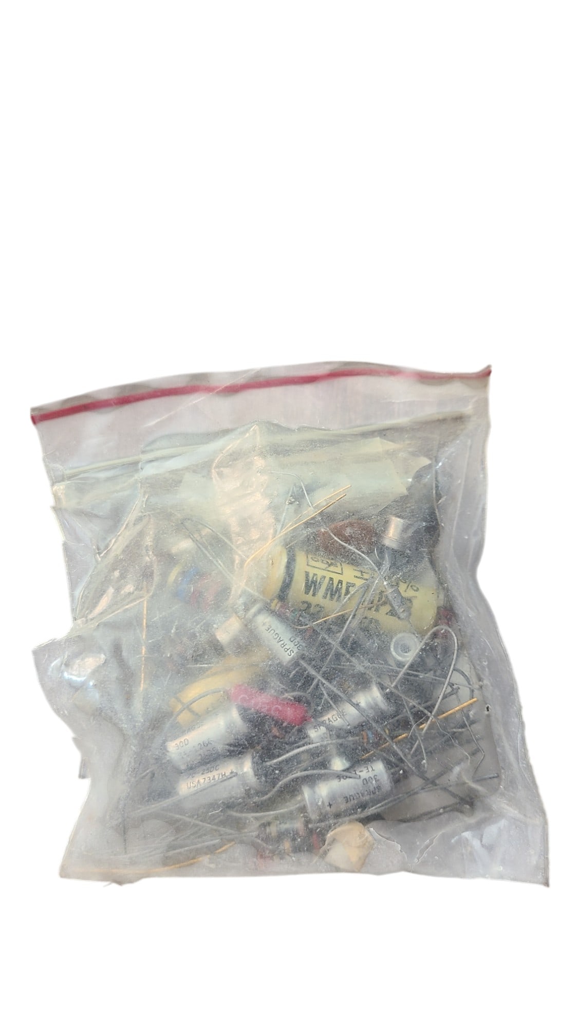 Torn Bag of Pins: Don't miss this rare opportunity to acquire a mysterious collectable of authentic NASA items, sourced directly from the estate of Charles Bell. Each item in this exclusive lot is guaranteed genuine an