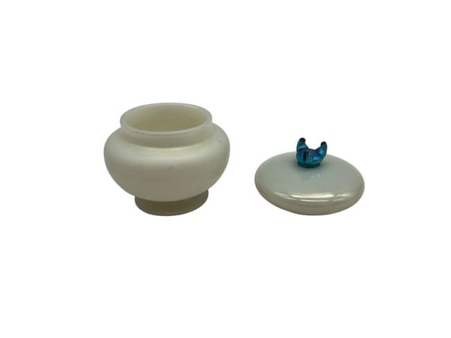 Iridescent Pearl Trinket Box with Blue Anodized Accent Lid: Discover a charming treasure with this iridescent pearl trinket box, perfect for storing small keepsakes or adding a touch of elegance to your dÃ©cor. The box features a lustrous, pearl-like finish 