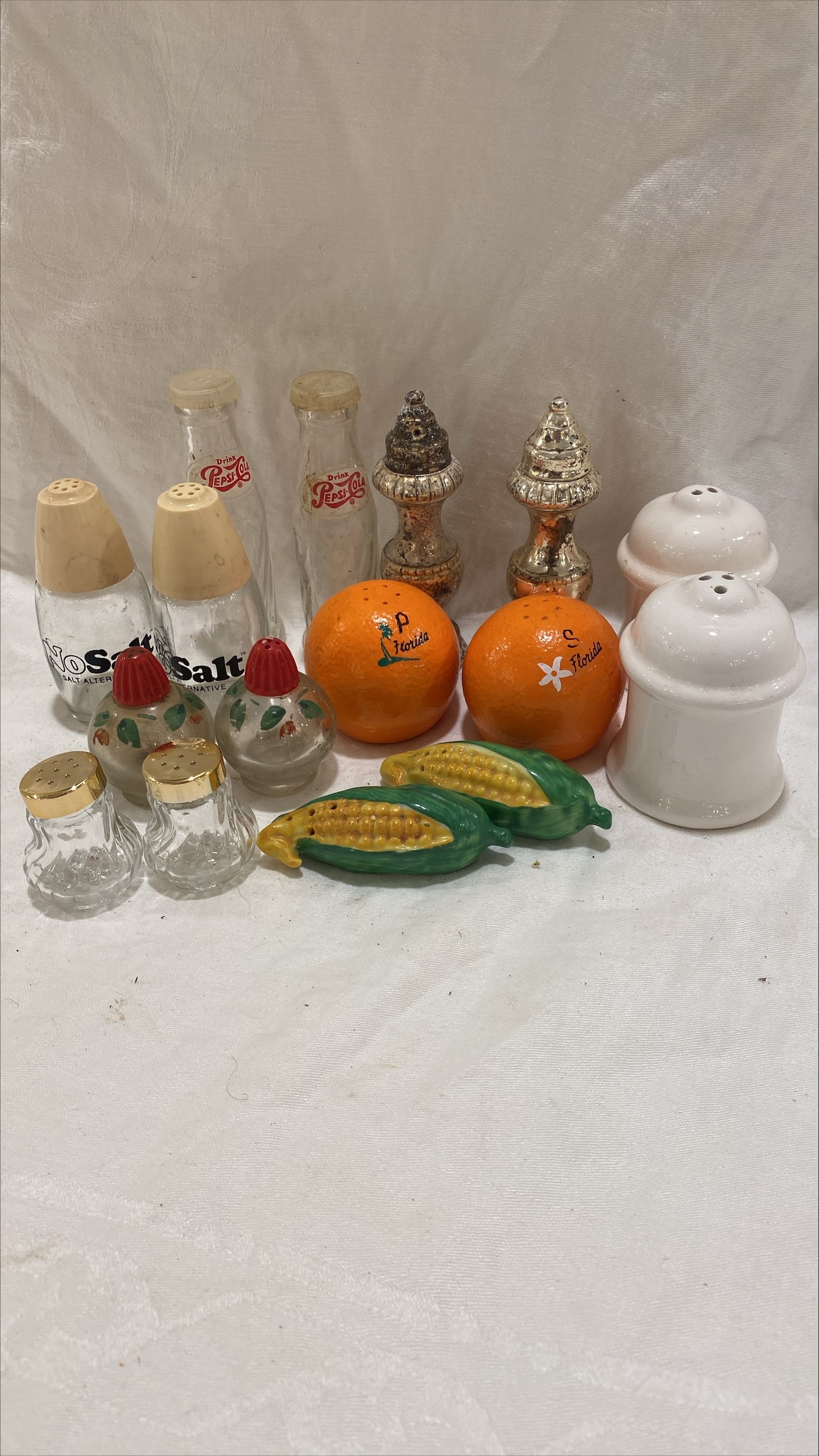 Salt and Pepper Shaker Sets: 8-sets of vintage Salt and Pepper Shakers glass and ceramic 12"x12"