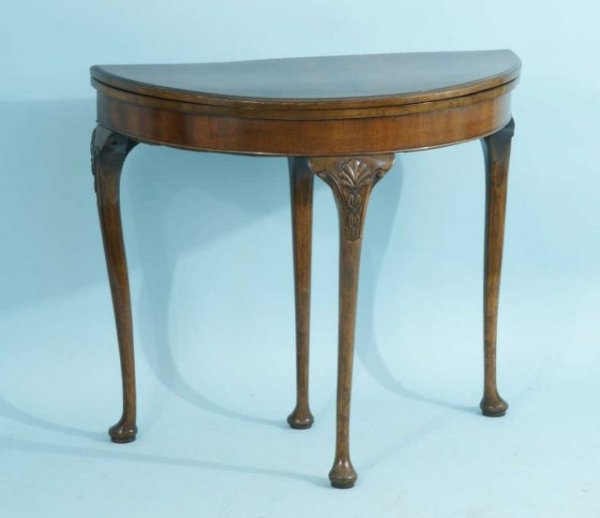 ENGLISH MAHOGANY DEMILUNE FLIP-TOP GAME TABLE: ENGLISH MAHOGANY DRAW LEG QUEEN ANN STYLE DEMILUNE FLIP-TOP GAME TABLE. CIRCA 1900. Height: 28 1/2 in. by Width: 31 1/2 in. by Depth: 29 1/2 in.