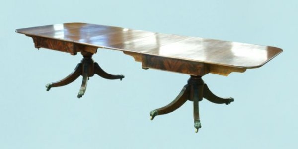 MAHOGANY DOUBLE PEDESTAL TABLE, CIRCA 1840: ANTIQUE AMERICAN MAHOGANY DOUBLE PEDESTAL DROP LEAF DINING TABLE. CIRCA 1840. FINISH HAS SLIGHT DAMAGE. Height: 29 1/2 in. by Width: 123 in. by Depth: 48 in.