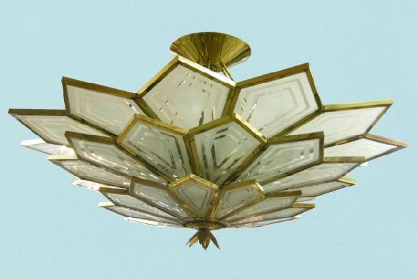 ART DECO STARBURST GLASS & BRASS CHANDELIER: ART DECO STARBURST FROSTED GLASS AND BRASS CHANDELIER. Height: 45 in. by Width: 65 in. by Depth: 65 in.