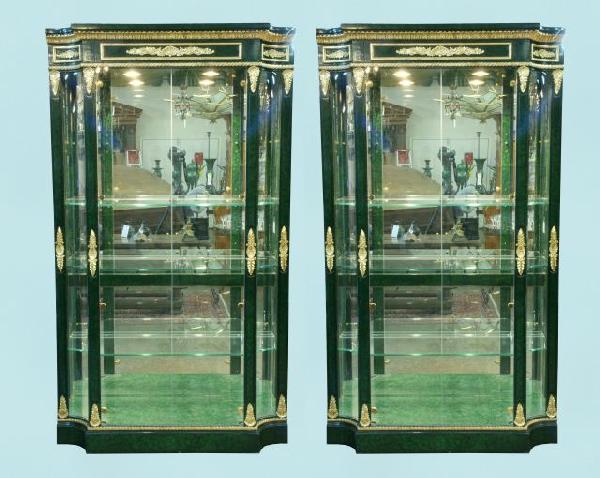 "GRAND PROVENANCE" BY HENREDON DISPLAY CASES: PAIR OF "GRAND PROVENANCE" BY HENREDON DISPLAY CASES WITH FAUX MALACHITE FINISH. Adjustable interior lighting and four glass shelves each. Height: 84 1/2 in. by Width: 48 in. by Depth: 16 in.
