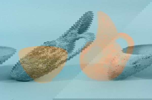 HITTITE CERAMIC-TERRA COTTA PITCHER & BOWL: HITTITE CERAMIC-TERRA COTTA PITCHER & BOWL. EXCAVATED NEAR CITY OF AYDIN, OLD CITY OF SOMA, TURKEY, WHICH IS EAST OF EPHESUS AND IZMIR Height: 5 1/2 and 2 in. by Width: 4 and 3 1/2 in. by Depth: 3 1/2