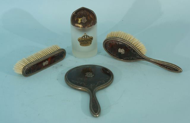 STERLING SILVER AND TORTOISE SHELL BRUSH SET: STERLING SILVER AND TORTOISE SHELL BRUSH SET WITH MIRROR. Height: 10 in. by Width: 5 in. by Depth: 3 in.
