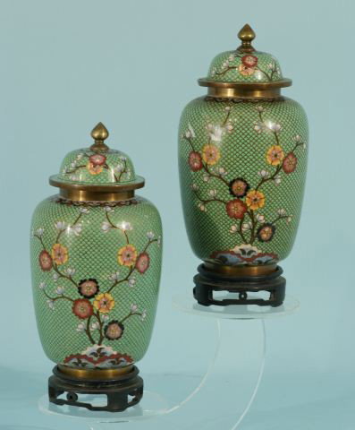PAIR OF GREEN CHINESE CLOISONNE TEMPLE JARS: PAIR OF GREEN CHINESE CLOISONNE TEMPLE JARS WITH LIDS AND STANDS. Height: 11 in. by Width: 5 in. by Depth: 5 in.