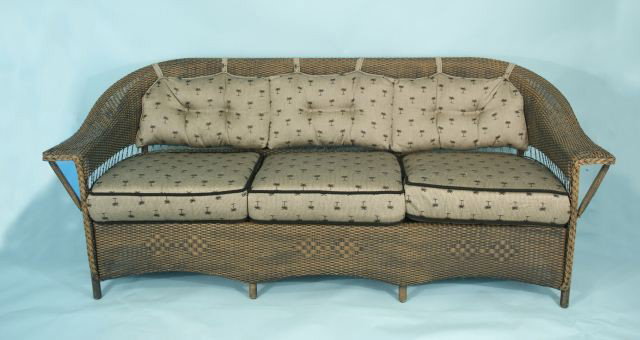 LOT OF FOUR-PIECE GROUP OF WICKER GARDEN FURNITURE: LOT OF FOUR-PIECE GROUP OF WICKER GARDEN FURNITURE. SOFA, ROCKER, COFFEE TABLE, END TABLE. Coffee table measures 20 by 42 by 22 in. End table is 21 by 22 in. square. Height: 33 and 33 in. by Width: 86