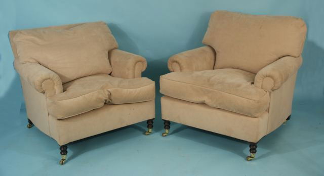 PAIR OF GEORGE SMITH SUEDE CLUB CHAIRS ON CASTERS: PAIR OF GEORGE SMITH SUEDE CLUB CHAIRS ON CASTERS. Height: 30 1/2 and 35 in. by Width: 36 in. by Depth: 41 in.