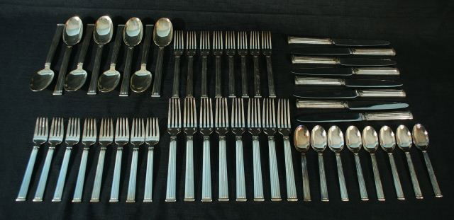 SERVICE FOR EIGHT "TRIADE" CHRISTOFLE FLATWARE: SERVICE FOR EIGHT "TRIADE" CHRISTOFLE FRANCE SILVERPLATE FLATWARE. 8 (8 IN.) DINNER FORK, 8 (6 3/4 IN.) SALAD FORKS, 8 (6 1/2 IN.) DESSERT FORKS, 8 (8 1/4 IN.) TABLESPOONS, 8 (6 IN.) TEASPOONS.