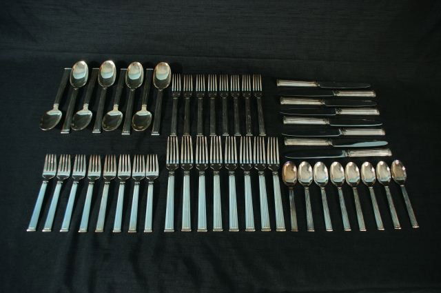 SERVICE FOR EIGHT "TRIADE" CHRISTOFLE FLATWARE: SERVICE FOR EIGHT "TRIADE" CHRISTOFLE FRANCE SILVERPLATE FLATWARE. 8 (8 IN.) DINNER FORK, 8 (6 3/4 IN.) SALAD FORKS, 8 (6 1/2 IN.) DESSERT FORKS, 8 (8 1/4 IN.) TABLESPOONS, 8 (6 IN.) TEASPOONS.