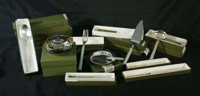 TWENTY-ONE "TRIADE" CHRISTOFLE SERVING PIECES: LOT OF TWENTY-ONE "TRIADE" CHRISTOFLE SILVERPLATE SERVING PIECES. 6 (10 IN.) SERVING SPOONS, 3 (10 3/4 IN.) CAKE SERVERS, 1 (10 3/4 IN.) MEAT FORK, 2 (10 IN.) MEAT FORKS, 1 (13 IN.) CAKE KNIFE, 2 (7 I