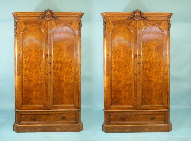 PAIR OF ANTIQUE VICTORIAN BURLED WALNUT ARMOIRES: PAIR OF ANTIQUE VICTORIAN BURLED WALNUT ARMOIRES. ONE IS A LINEN PRESS AND ONE IS A CLOSET. Height: 86 in. by Width: 51 in. by Depth: 26 in.