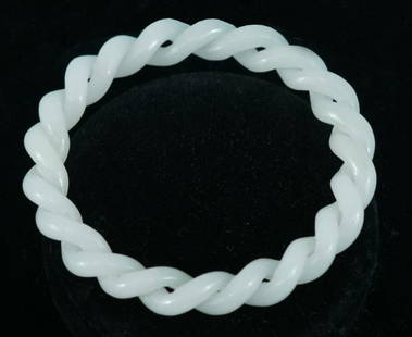 CARVED WHITE JADE ROPE TWIST BRACELET: CARVED WHITE JADE ROPE TWIST BRACELET. Height: 1/2 in. by Width: 3 1/4 in. by Depth: 3 1/4 in.