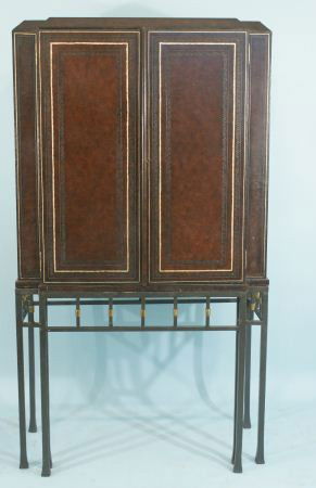 TOOLED LEATHER CABINET WITH IRON BASE: TOOLED LEATHER CABINET WITH IRON BASE BY MAITLAND-SMITH. Height: 71 1/2 in. by Width: 40 in. by Depth: 18 1/2 in.