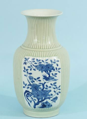 FISH TAIL VASE WITH BIRDS: FISH TAIL DESIGN VASE WITH BIRDS IN BLUE AND WHITE PORCELAIN AND CELADON. Height: 13 1/2 in. by Width: 8 in. by Depth: 8 IN.