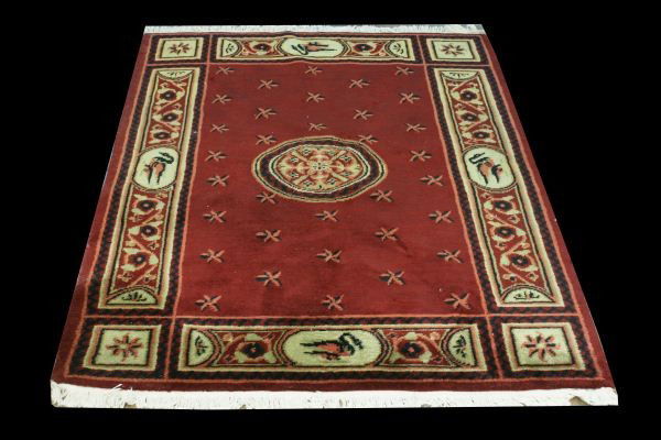 SMALL ARE RUG IN OLIVE, EBONY IN A PLUM BACKROUND: SMALL HAND KNOTTED AREA RUG IN OLIVE, EBONY IN A PLUM BACKROUND. Height: 6 ft. 6 1/2 in. by Width: 4 ft. 0 in.
