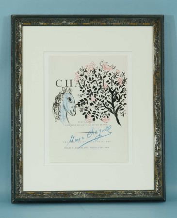 CHAGALL BY WERNER HAFTMAN TITLE PAGE DRAWING: ATTRIBUTED TO CHAGALL BY WERNER HAFTMAN, COPYRIGHT 1972, FRAMED TITLE PAGE, WITH MIXED MEDIA DRAWING, BOLDLY SIGNED IN BLUE COLORED PENCIL. SMALL AREAS OF SLIGHT SCUFFING, OTHERWISE IN VERY GOOD CONDI