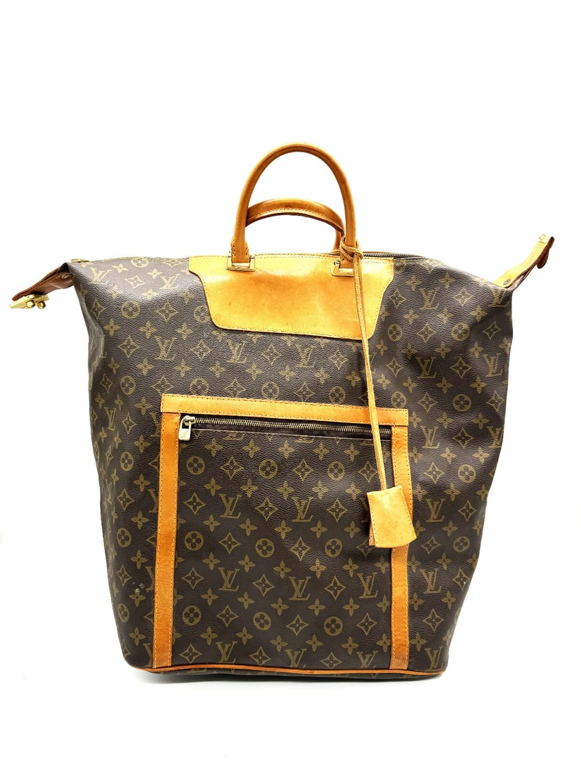 Vintage Louis Vuitton Steamer Bag: Vintage Louis Vuitton Steamer BagBeautiful travel bag in monogram canvas and leather. This large size is no longer available in Louis Vuitton stores.This is a collector piece. It features its serial n