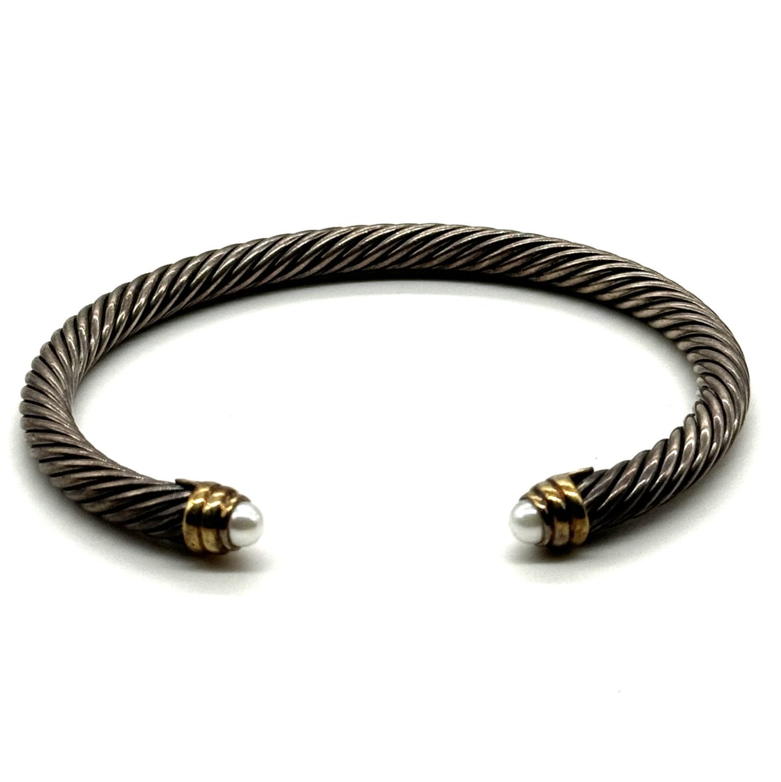 David Yurman 18kt yellow gold and sterling silver Cable Classics pearl bracelet: David Yurman 18kt yellow gold and sterling silver Cable Classics pearl braceletDavid Yurman’s Cable collection is considered one of the house’s most iconic designs. With an intricate design, this