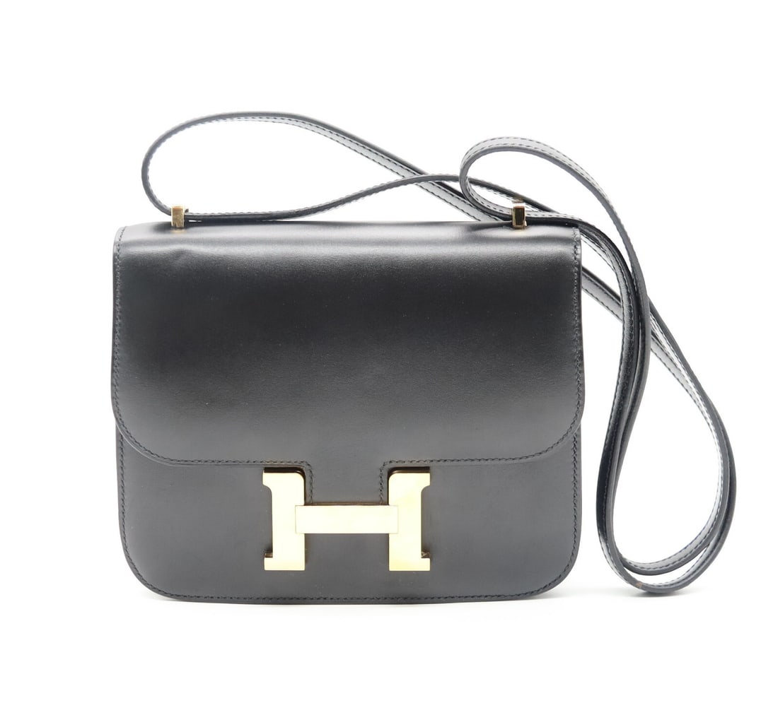 Hermes mini Constance 18 Black Box Leather GOLD HARDWARE: Hermes mini Constance 18 Black Box Leather GOLD HARDWAREThis is an authentic HERMES Box Leather Constance 18 in Black with gold hardware This is a chic small bag that is finely crafted of luxurious bo