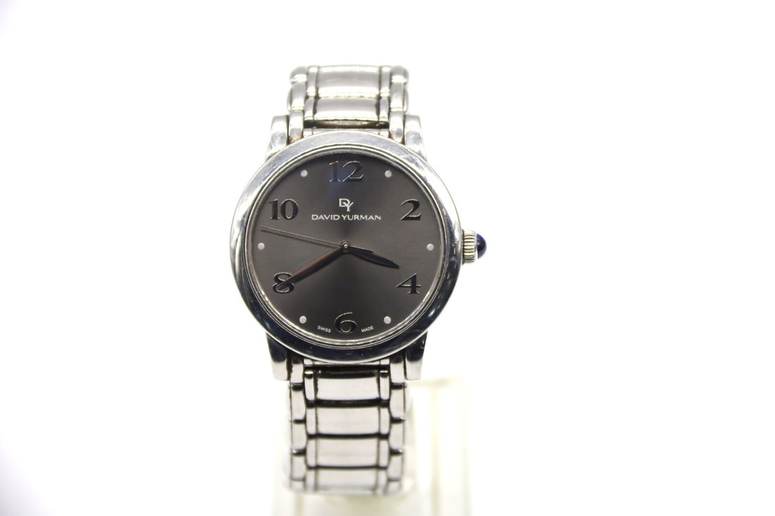 David Yurman T716-M 38mm 7 Jewels Stainless Swiss Quartz Unisex Watch: David Yurman T716-M 38mm 7 Jewels Stainless Swiss Quartz Unisex Watch.This is a gently preowned David Yurman 38MM Stainless Steel watch with a Swiss Quartz ETA movement Jewels.Case - Stainless steel G