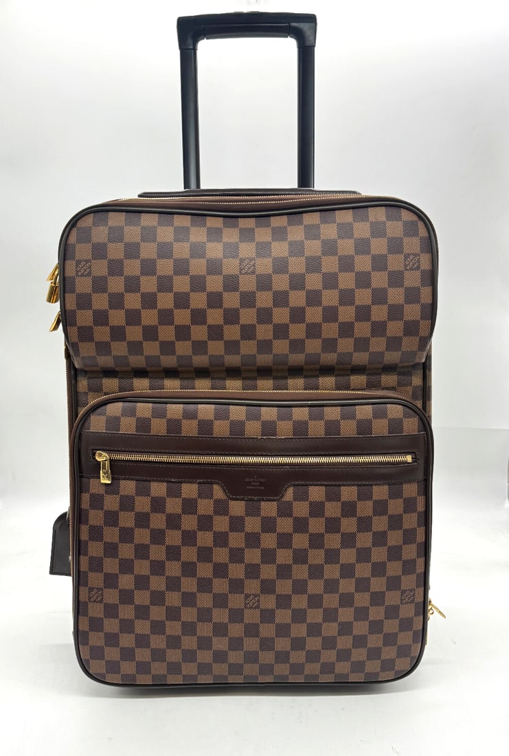 Louis Vuitton Suitcase Damier Ebene Pegase 55 Business: Louis Vuitton Suitcase Damier Ebene Pegase 55 BusinessThis is an authentic LOUIS VUITTON Damier Ebene Pegase 55 Business. This stylish suitcase is finely crafted of classic Louis Vuitton damier checke