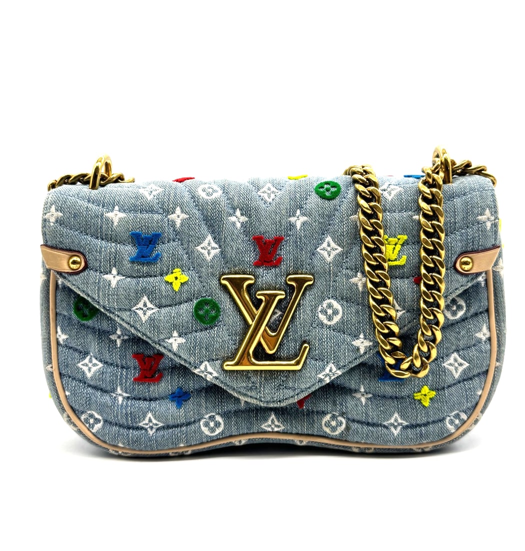 Louis Vuitton Embroidered Monogram Denim New Wave Chain Pochette Blue: This is an authentic LOUIS VUITTON Embroidered Monogram Denim New Wave Chain Pochette in Blue. This chic handbag is crafted of blue denim fabric with multicolor LV mini monogram and flower motif. The