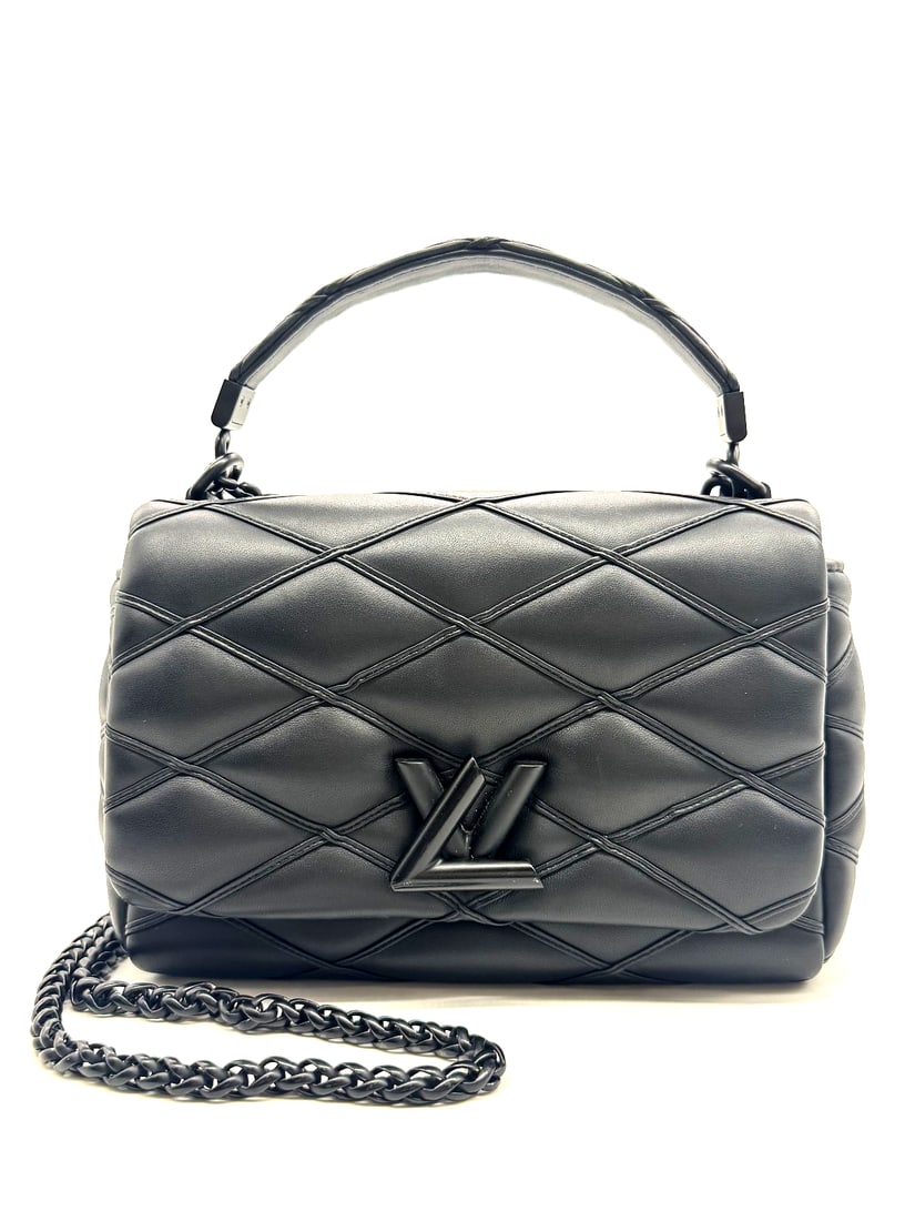 Louis Vuitton Handbag GO-14MM Limited Black Out collection: Part of the Black Out collection, this GO-14 MM holds timeless appeal with its monochromatic design. It is crafted from lambskin, patterned with the House’s signature Malletage quilting and accented